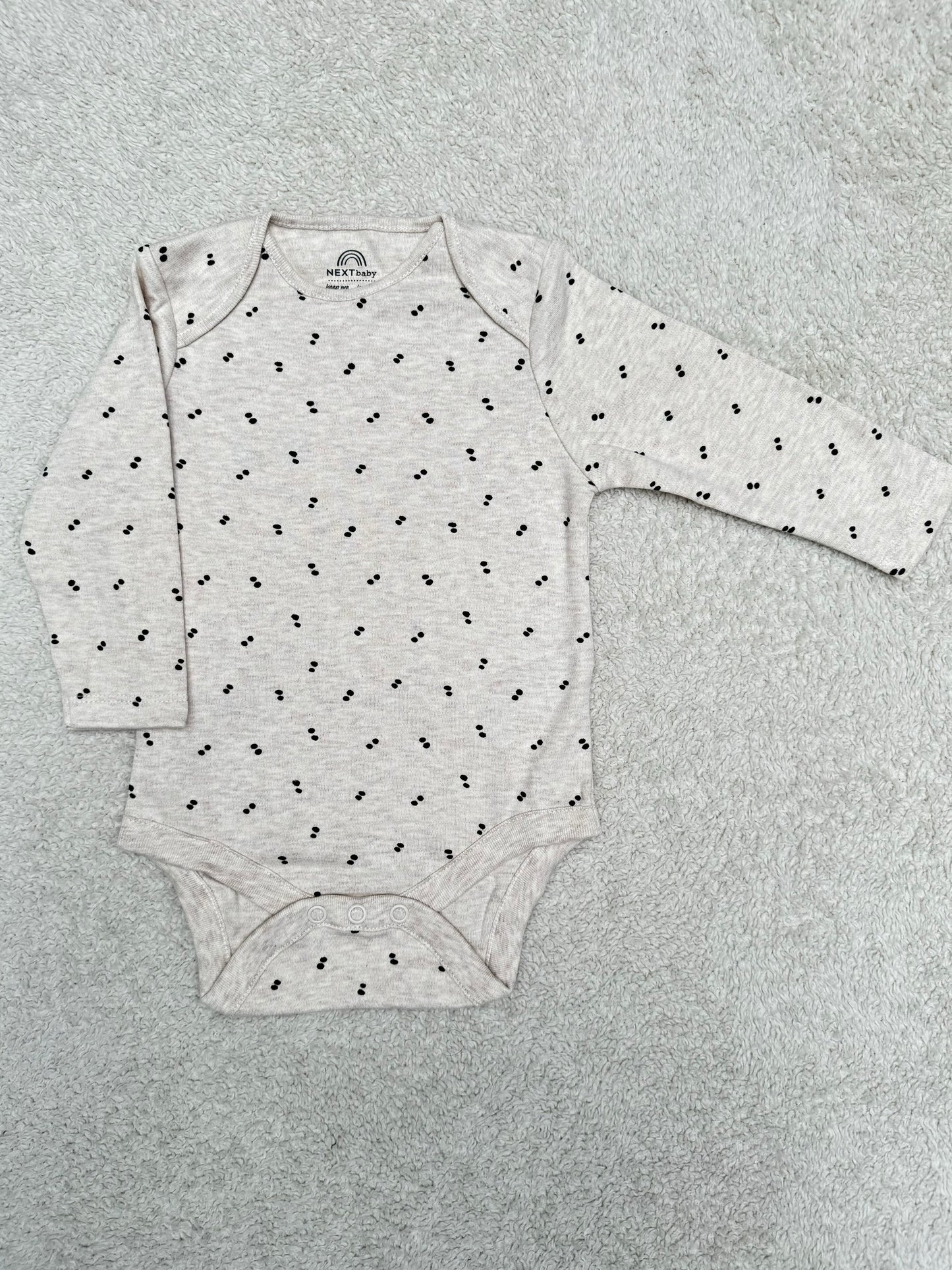 Neutral Off-White Black Spots Long Sleeve Bodysuit