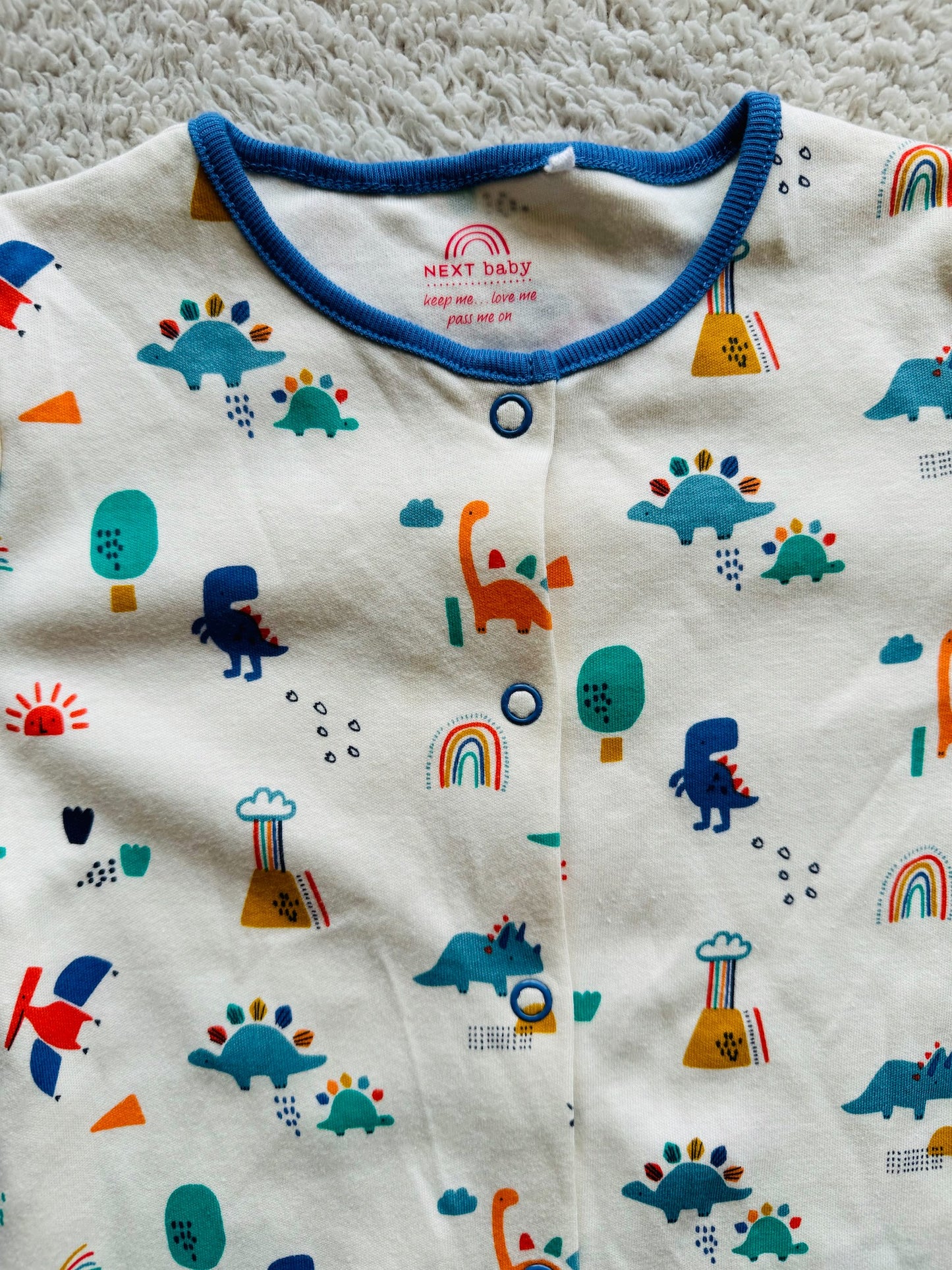 Jumper - Multi coloured dino on white