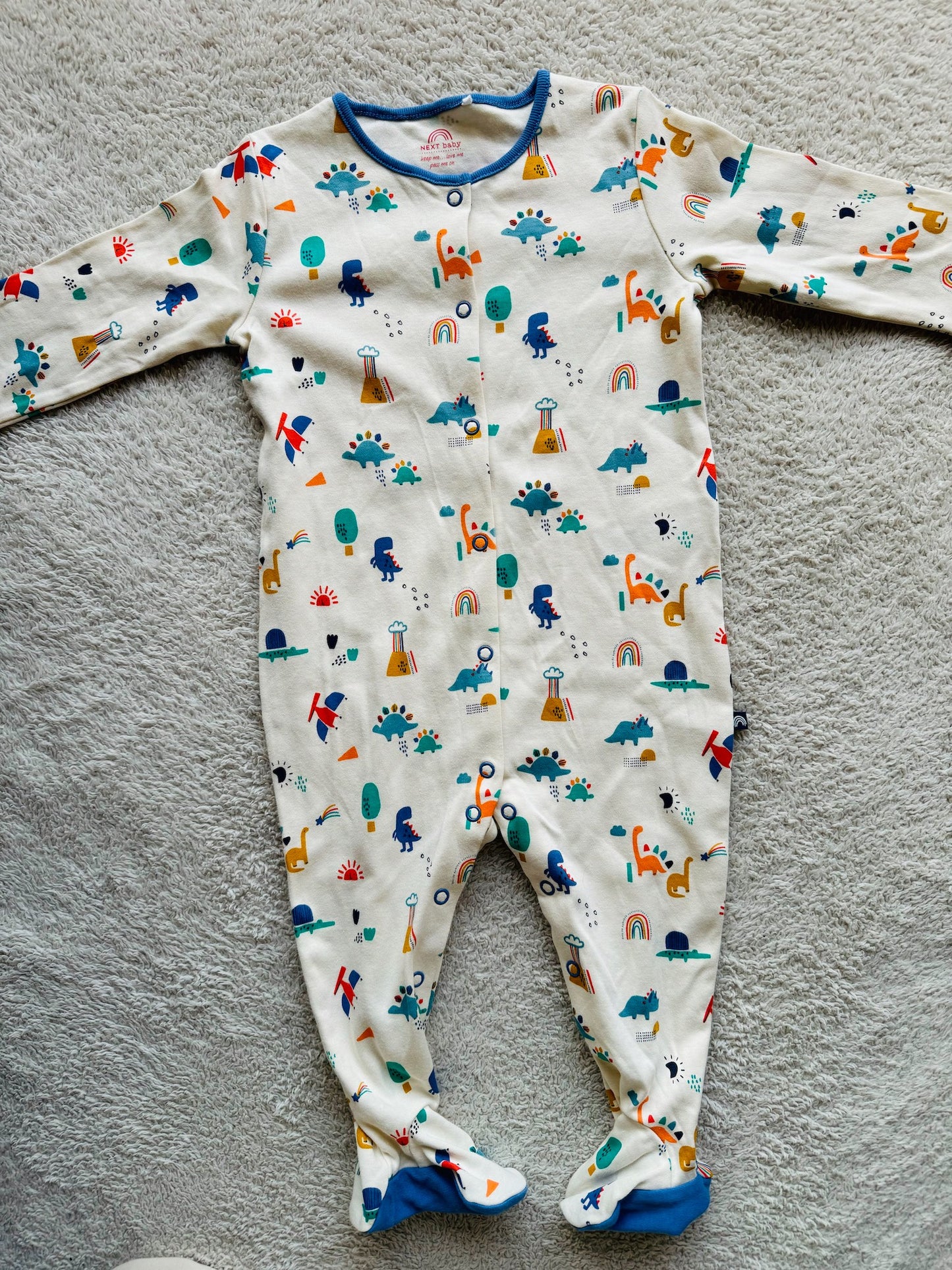 Jumper - Multi coloured dino on white