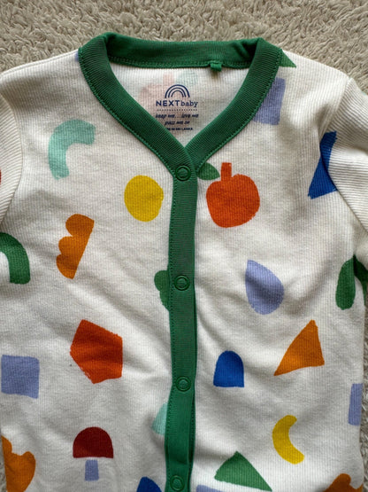 Jumper - Multi coloured shapes on white