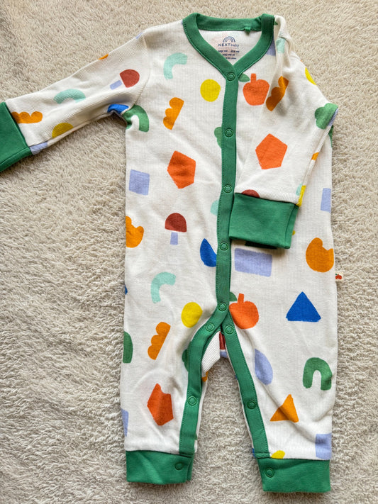 Jumper - Multi coloured shapes on white